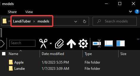 Visual of file explorer in the models directory, with two folders labeled "Landie" and "Apple"